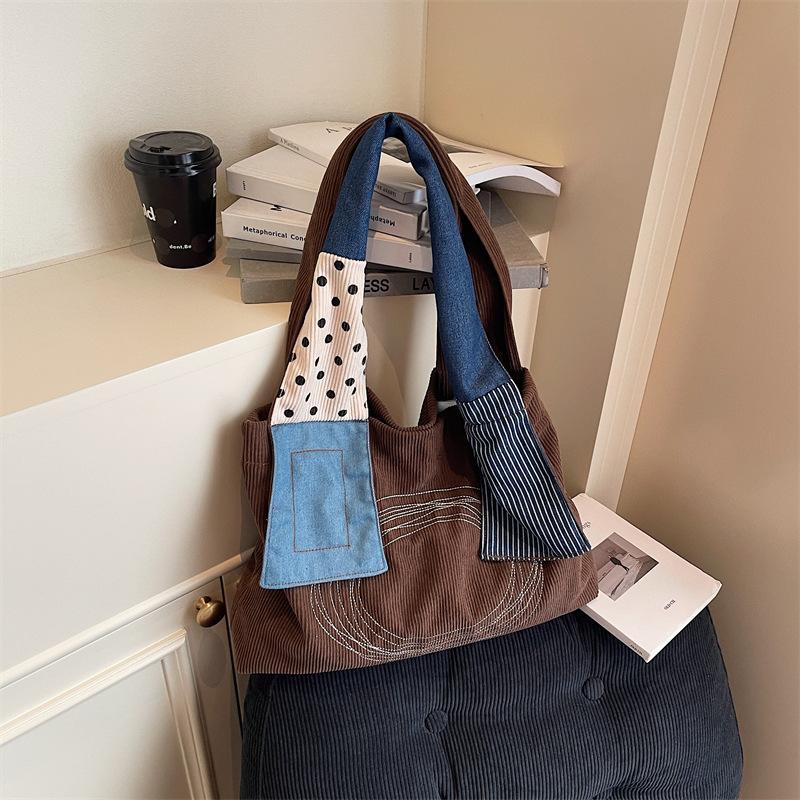 

Retro niche shoulder bag summer new tote bag tide splicing shopping bag large capacity student bag