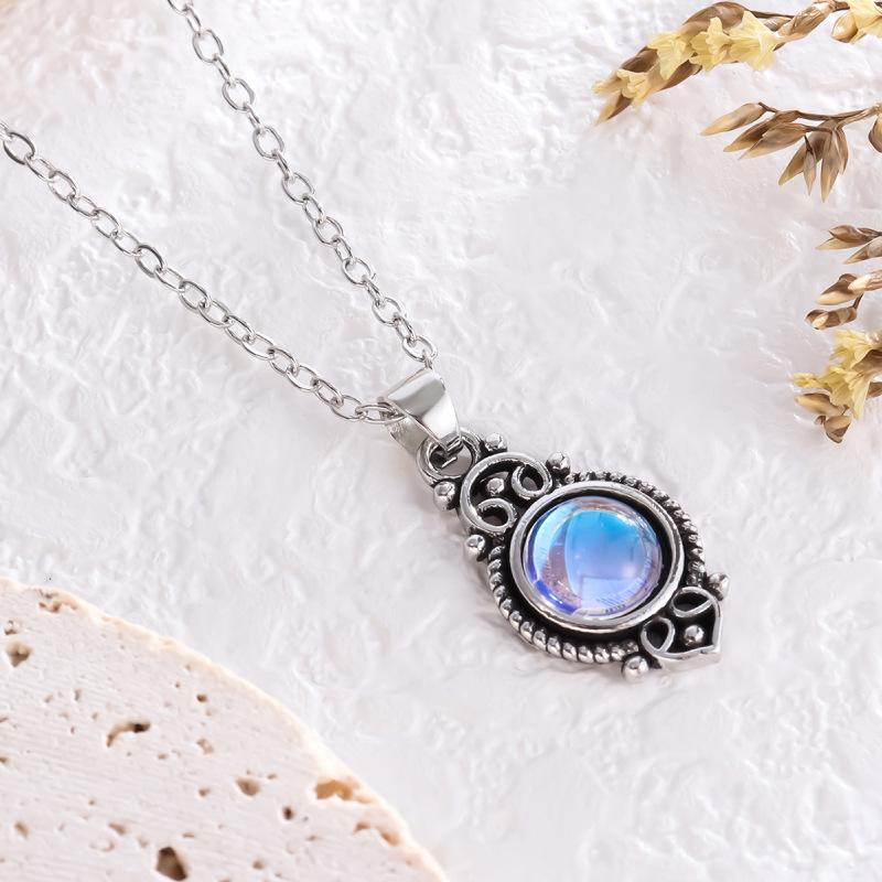 

A Bohemian-Style Garnet Pendant Necklace, Full Of Creativity, Featuring A Beautifully Carved Red Personalized Necklace Ornament.