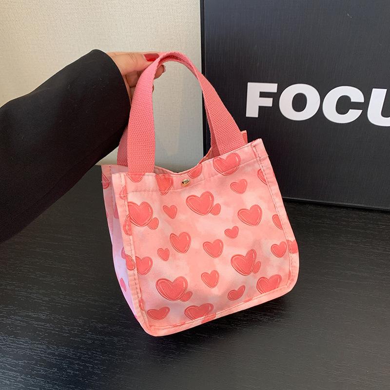 Large-capacity bag women's 2025 spring and summer new cute versatile shoulder bag love portable commuter tote bag