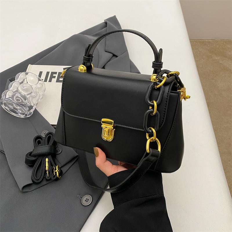 

Легкая роскошная женская сумка через плечо из искусственной кожи, модная короткая ручка, женские сумки для поездок на работу, новые трапециевидные сумки на одно плечо