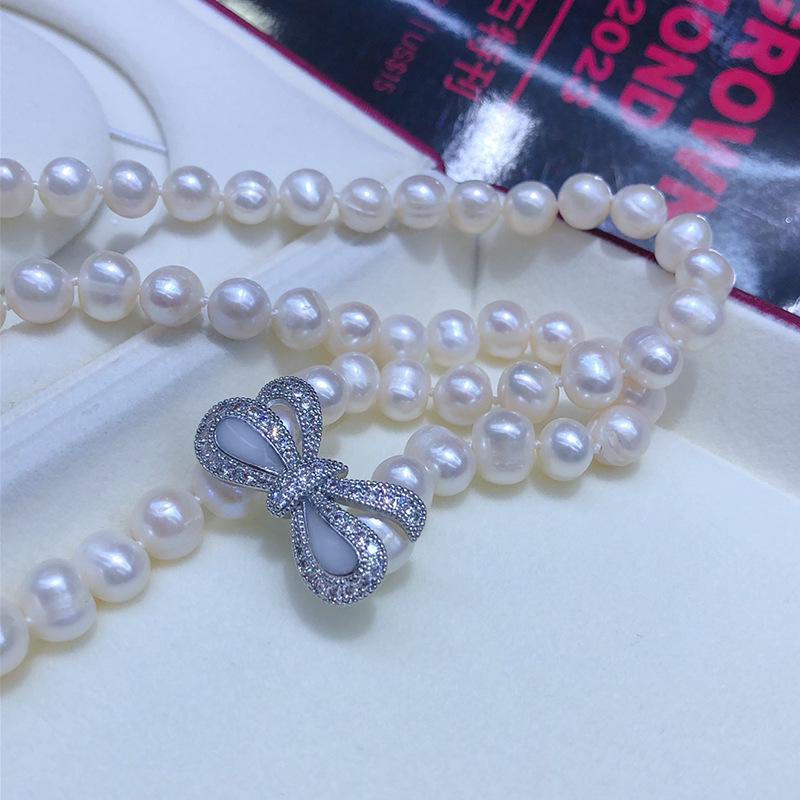 Elegant Bow-Style Freshwater Pearl Necklace - Near Round, Slightly Flawed, 60cm.