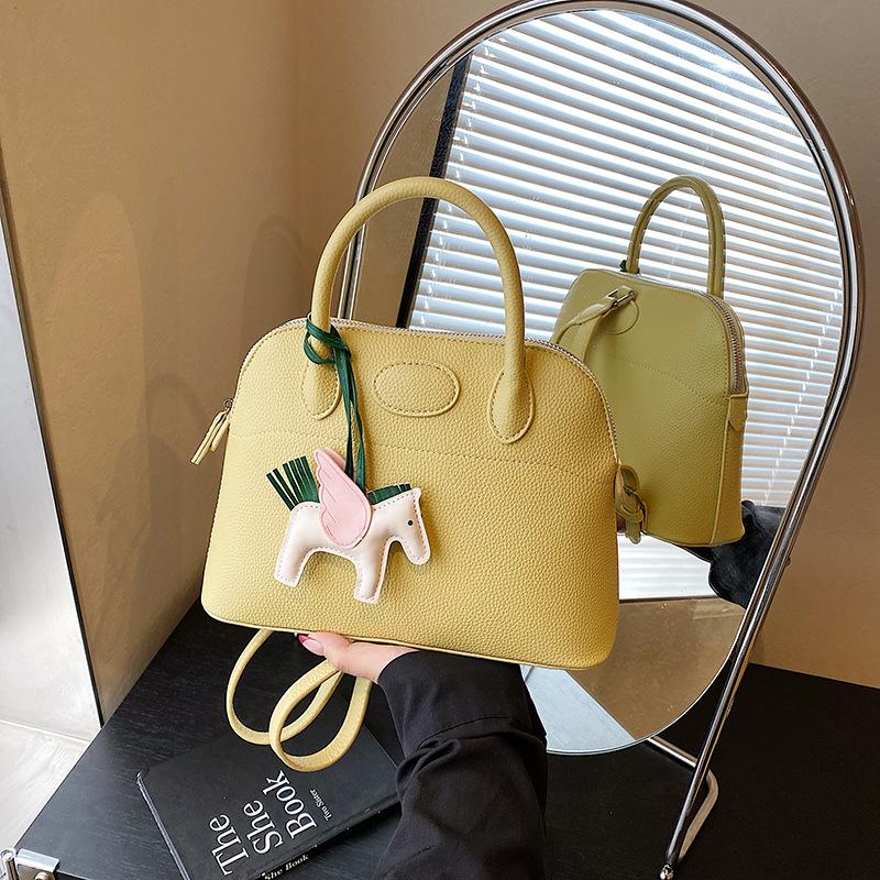 Fashion backpack women's new high-end versatile handbag niche design shell bag