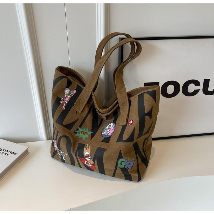 Canvas bag Women's large-capacity printed alphabet portable shoulder commuter tote bag Fashion new