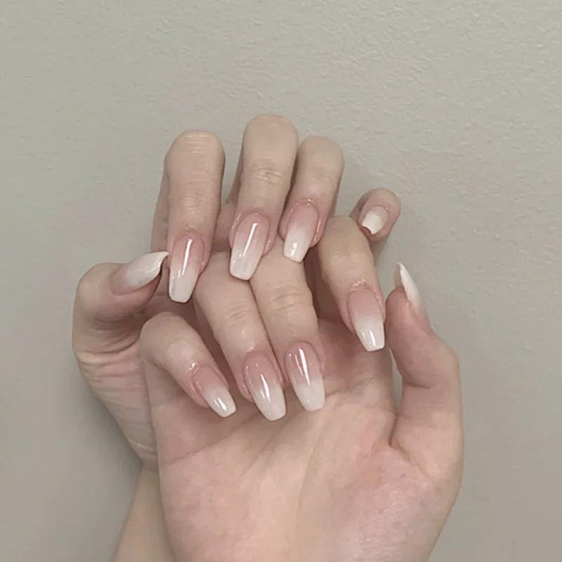 

Ballet Style White Gradient Fake Nail Tips - 24-Piece Set with Nail Stickers.