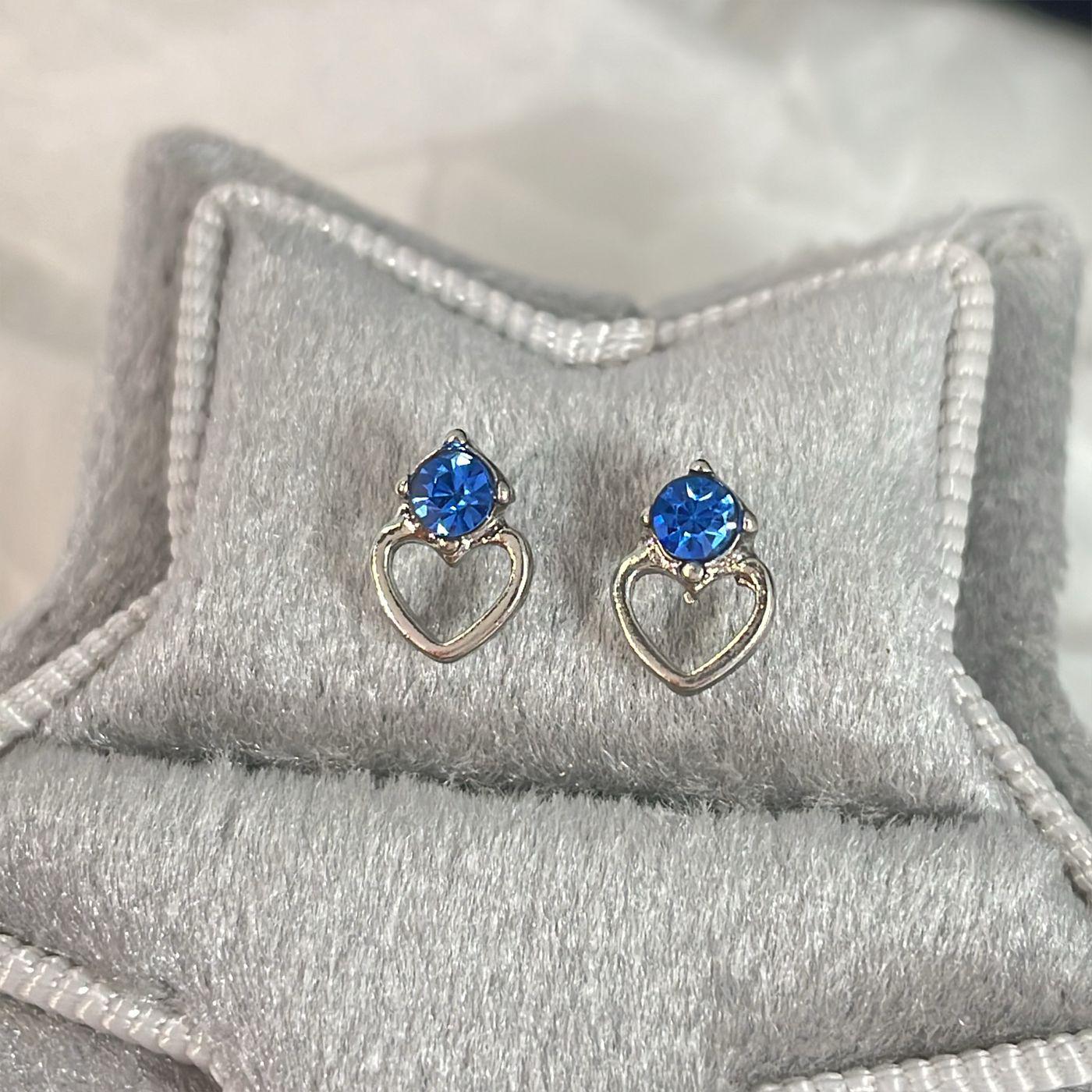 

Elegant Cross Sea Blue Diamond Earrings for Women with Silver Needle and Niche Design