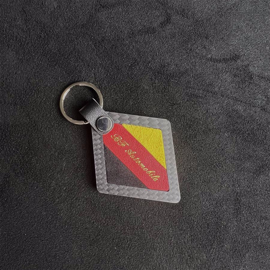 

Mercedes-AMG Style Suede Carbon Fiber Keychain with Italian, German, and French Flags