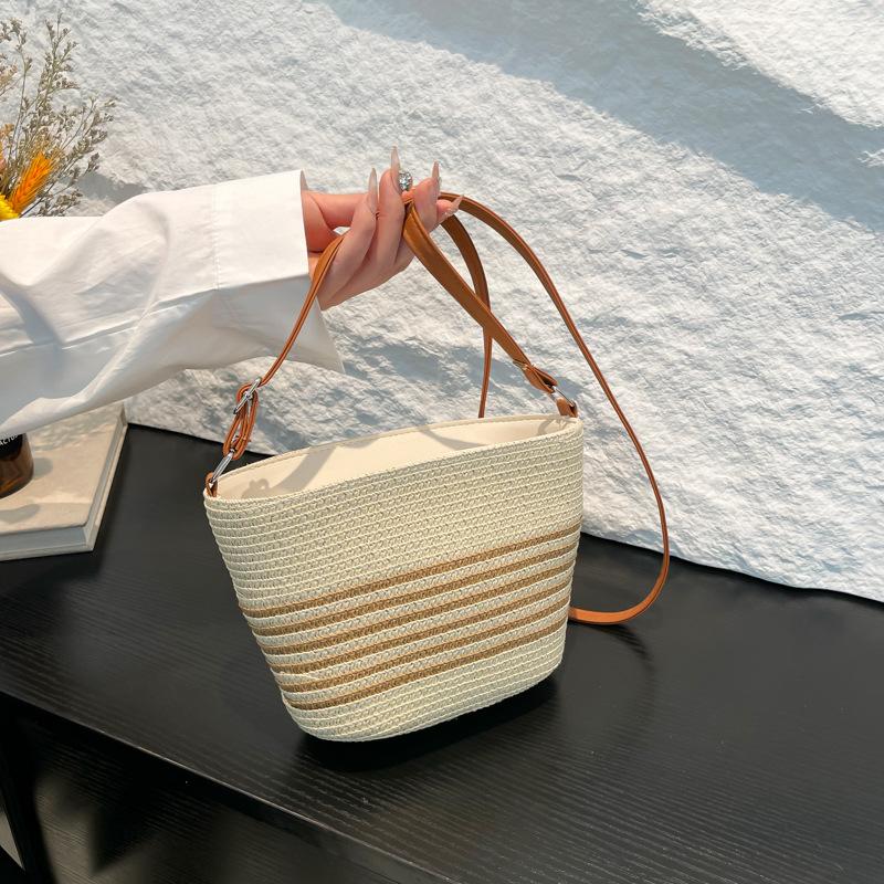 Spring Popular Vacation Style Straw Woven Bucket Woven Bag Women's Seaside Large Capacity Versatile Single Shoulder Messenger Bag Fashion