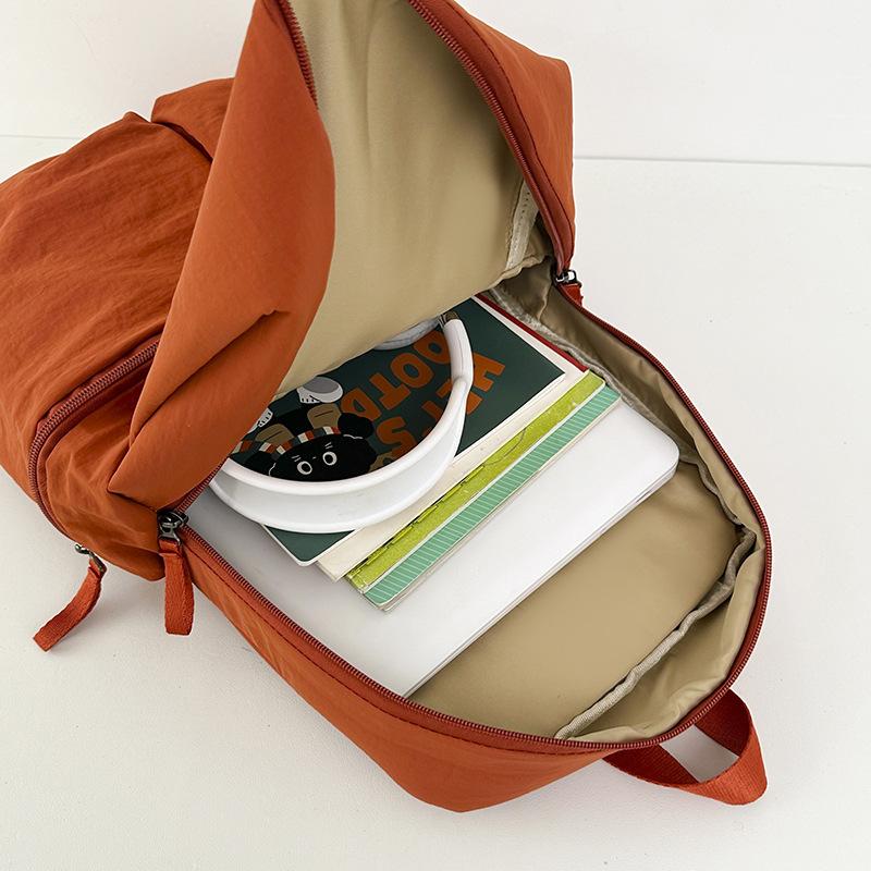 Schoolbag autumn new high-value Korean ins niche solid color simple backpack female students lightweight large-capacity backpack
