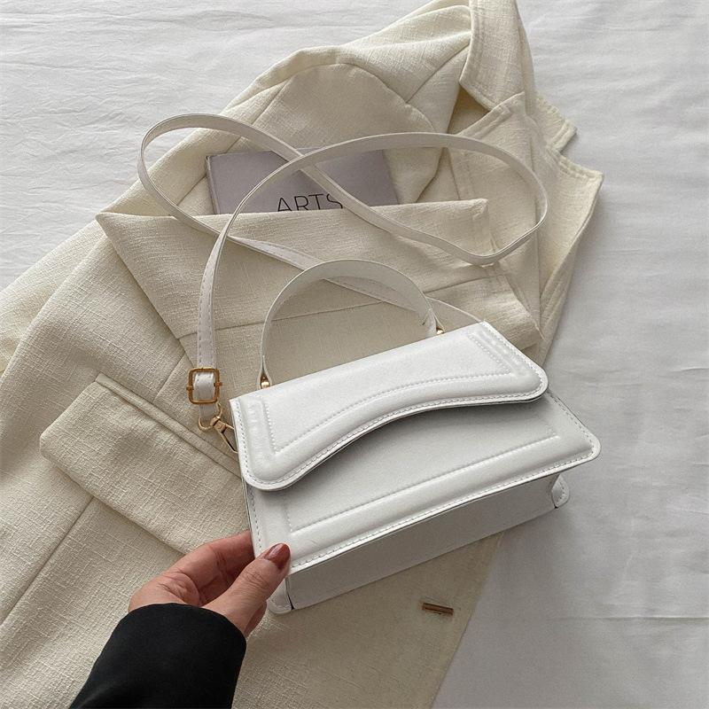 Foreign style simple solid color handbag 2025 early spring new versatile ins shoulder messenger bag small square bag women