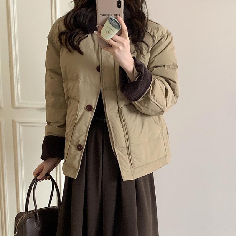 

Khaki short down jacket women s new design sense small loose fashion splicing warm jacket XL