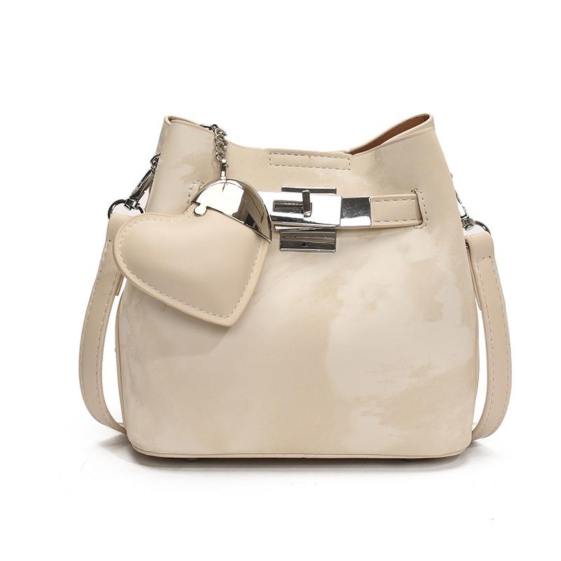 Spring and summer new Korean fashion high-end texture bucket bag niche design fashionable commuter versatile messenger women's bag