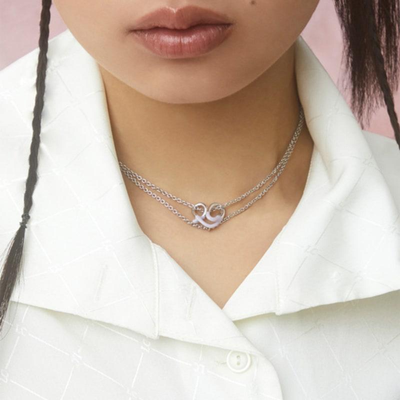 

NEUF PIECE TWISTED HEART NECKLACE 42+2+2cm