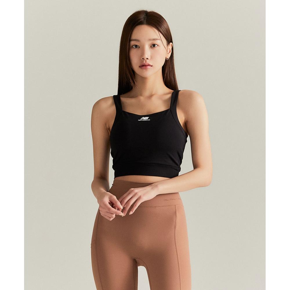 

NEW BALANCE NBN9D2W012 ЖЕНСКИЙ укороченный топ высокой натяжения (ЧЕРНЫЙ)