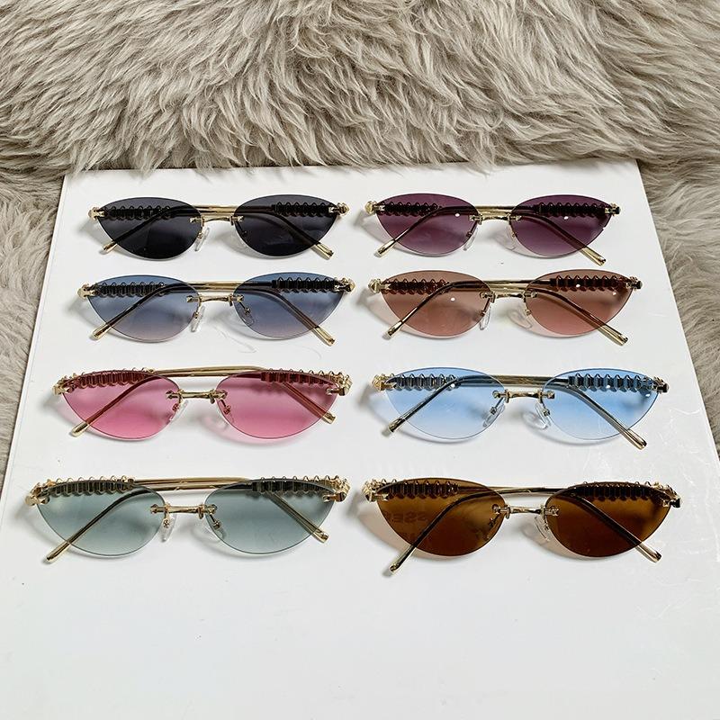 Fashion Cat Eye Sunglasses Luxury Design Rimless Cat Eye Women High-end Metal Leg Sunglasses Summer Travel Eyewear UV400