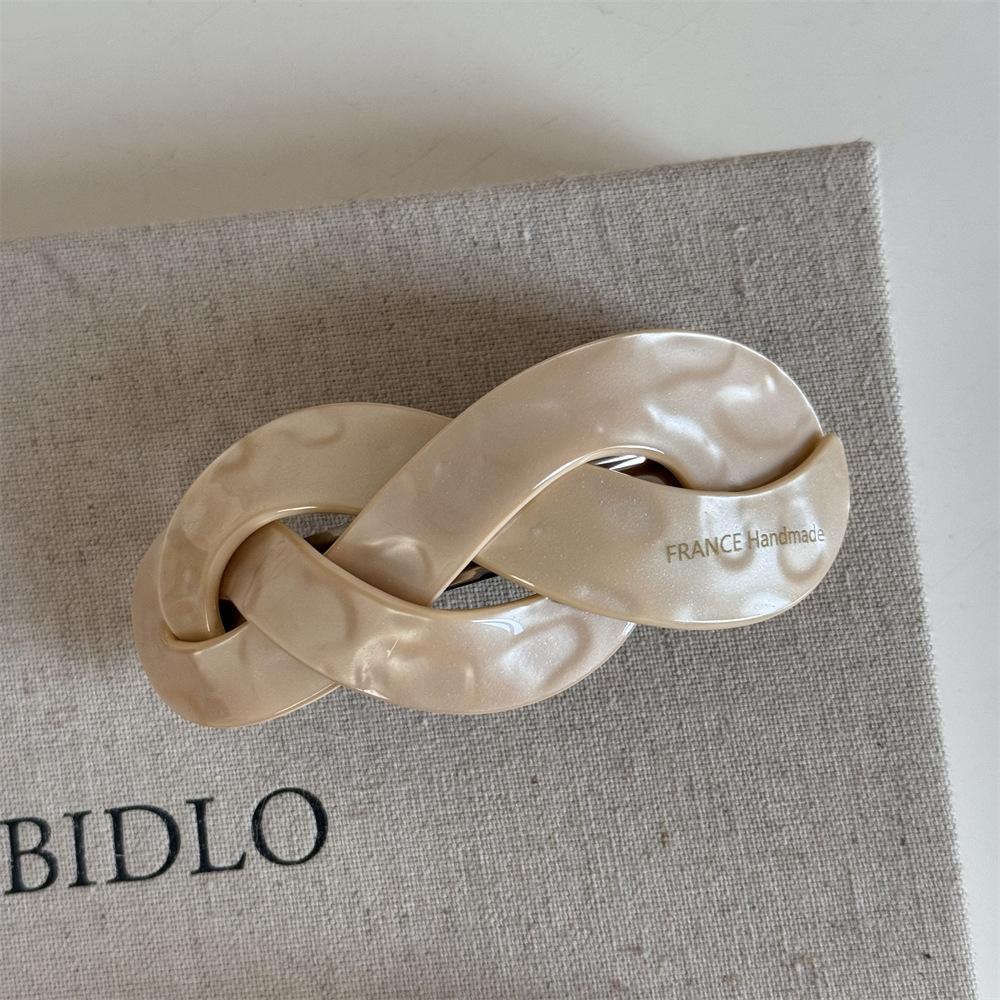 Korean version fashion French retro twist woven shape large ponytail spring clip disc hair top clip hair accessories new