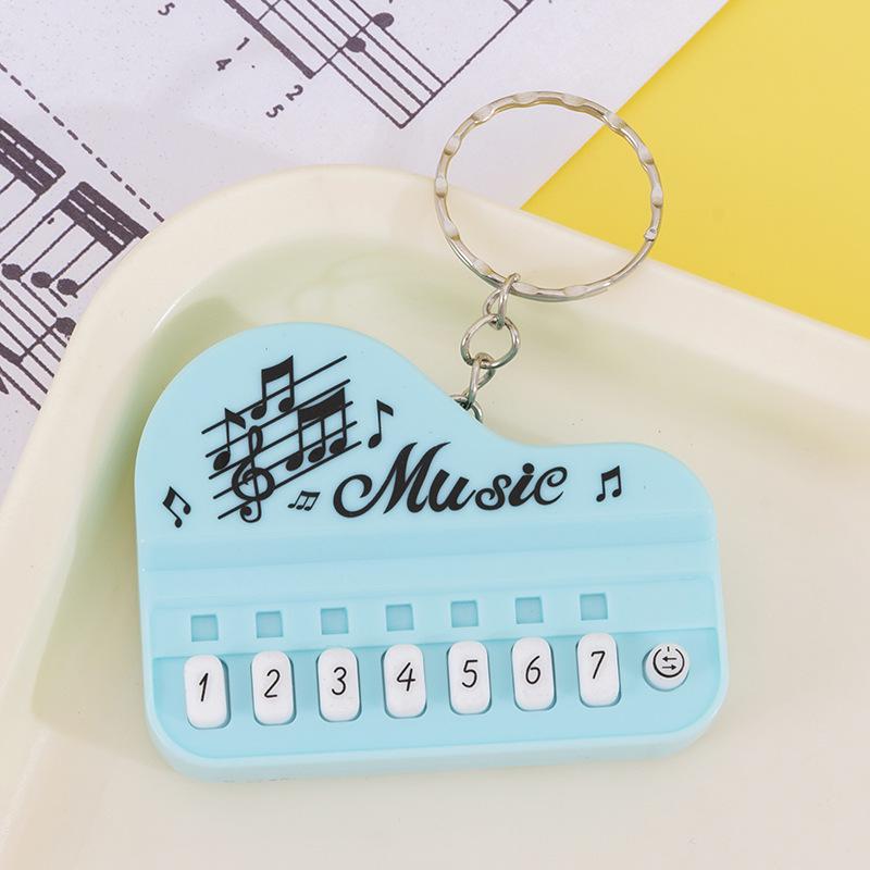 Mini Handheld Luminous Electronic Piano Keychain for Kids