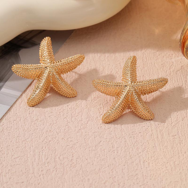 Dual-Layer Five-Petal Flower Earrings with Retro Striped Leaf Tassels