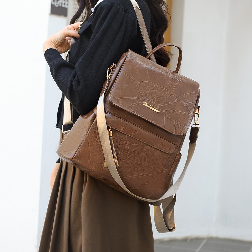 Женский многофункциональный рюкзак из мягкой кожи с кисточками в стиле ретро — фото 9