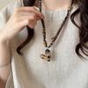 Elegant Leather Cord Heart Necklace with Wood Beads – Luxurious and Versatile for Autumn and Winter