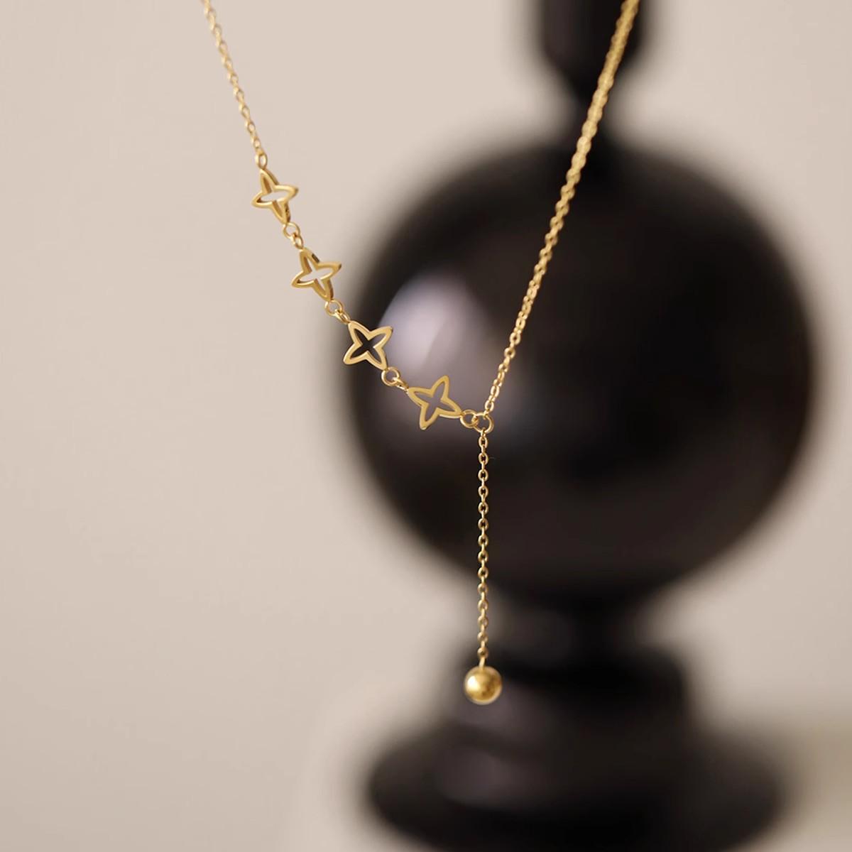 

Hollow star birthday necklace female fringed collarbone chain plated with 18k gold new niche design does not fade with jewelry