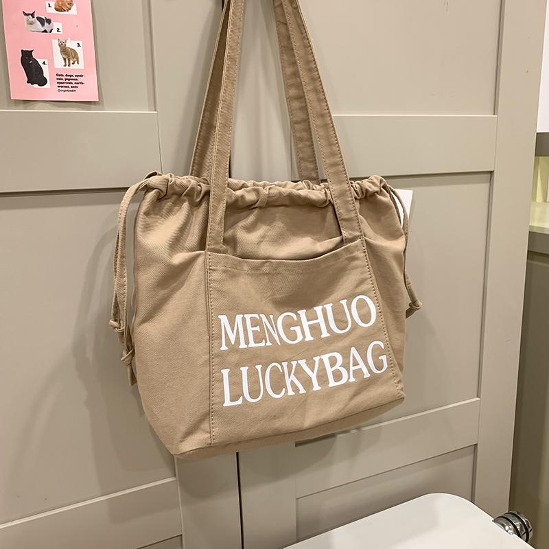 Джинсовая сумка женская сумка через плечо с завязками большая вместительная сумка-тоут — фото 9