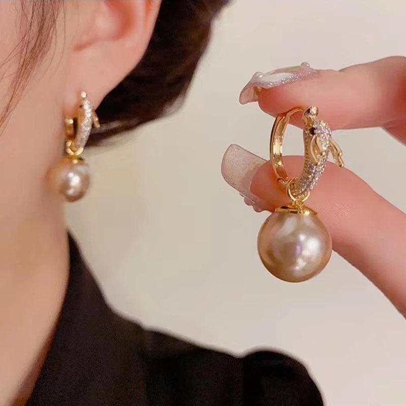 

Ретро Легкая Роскошь Змея Жемчуг Каффы - Уникальный Дизайн, Микро-паве, Универсальные Серьги для Двустороннего Ношения для Продвинутого Чувства Стиля.