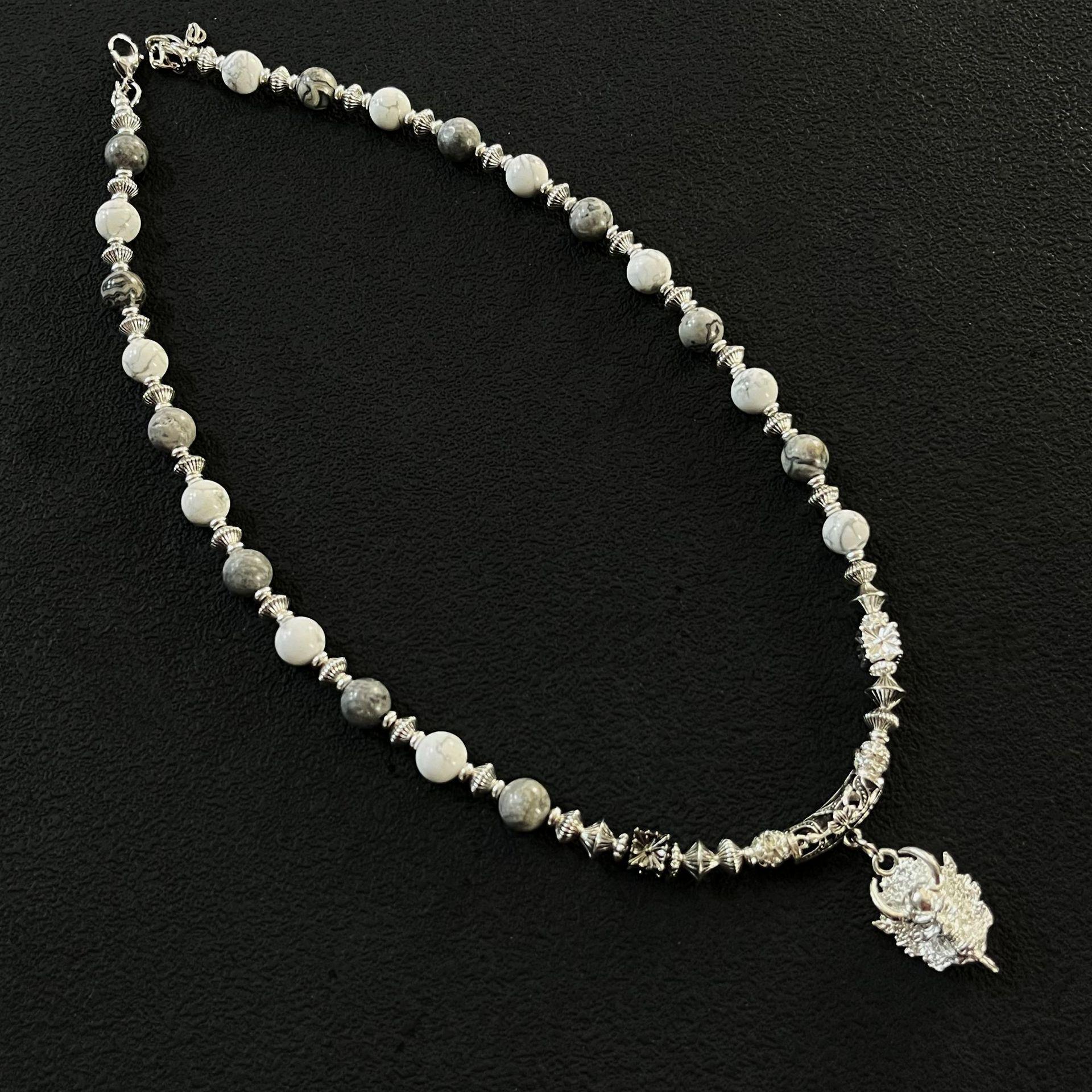 Handcrafted Earth Stone Skull Pendant Necklace with Retro Design