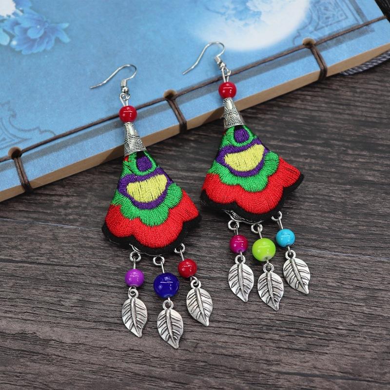 Retro hand-embroidered fabric earrings female long flower fringed versatile temperament performance earrings earrings