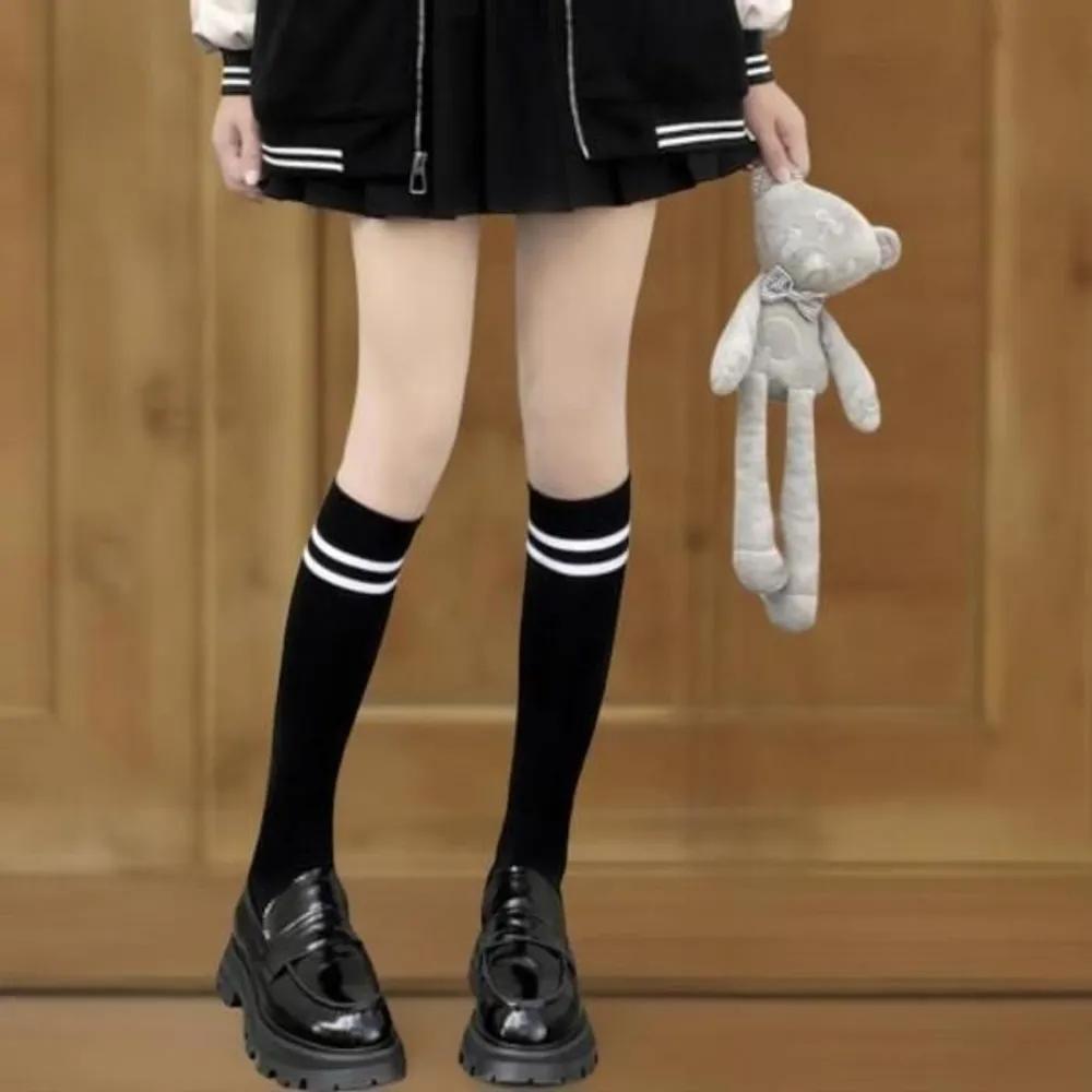 Sturdy long socks with striped design for female students
