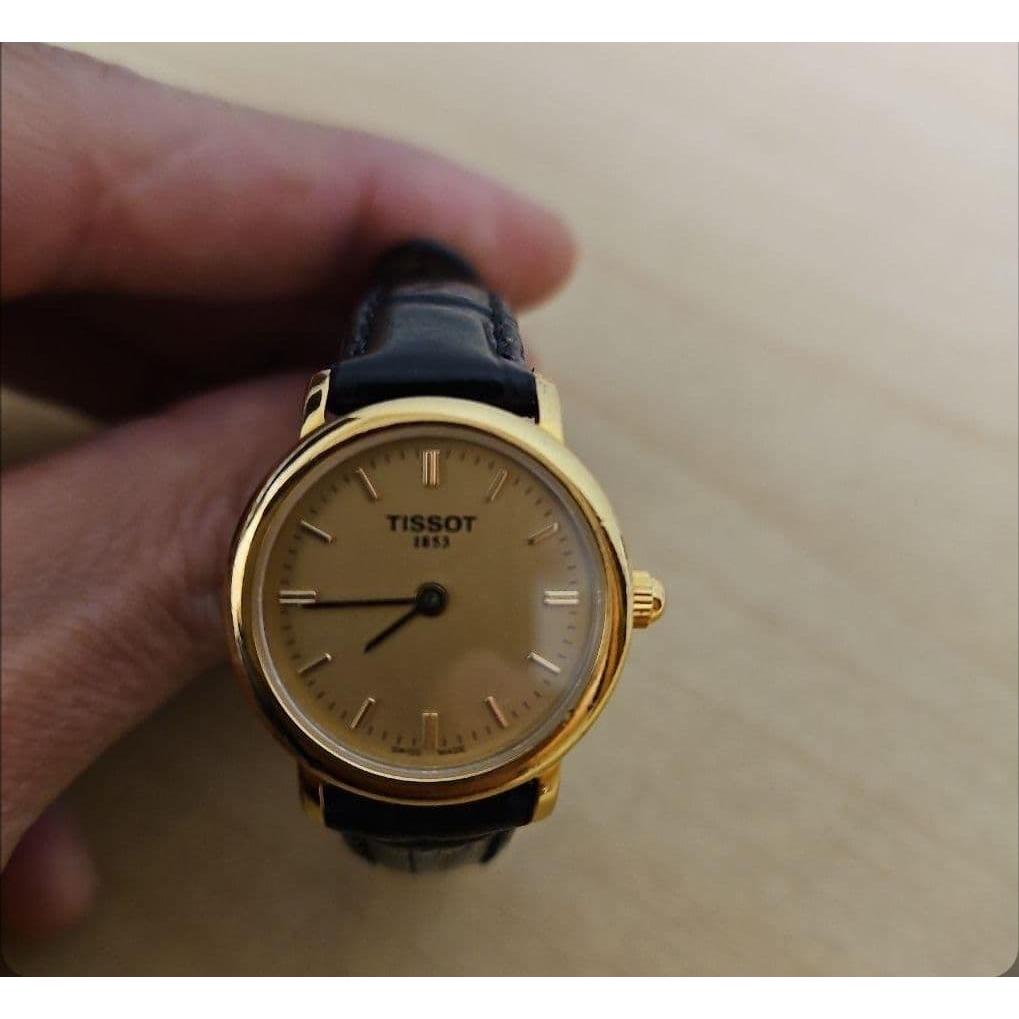 Used TISSOT watch gold leather