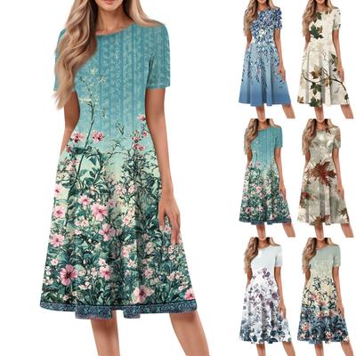 Dámske voľné ležérne a módne šaty s okrúhlym výstrihom a krátkymi rukávmi s potlačou strednej dĺžky