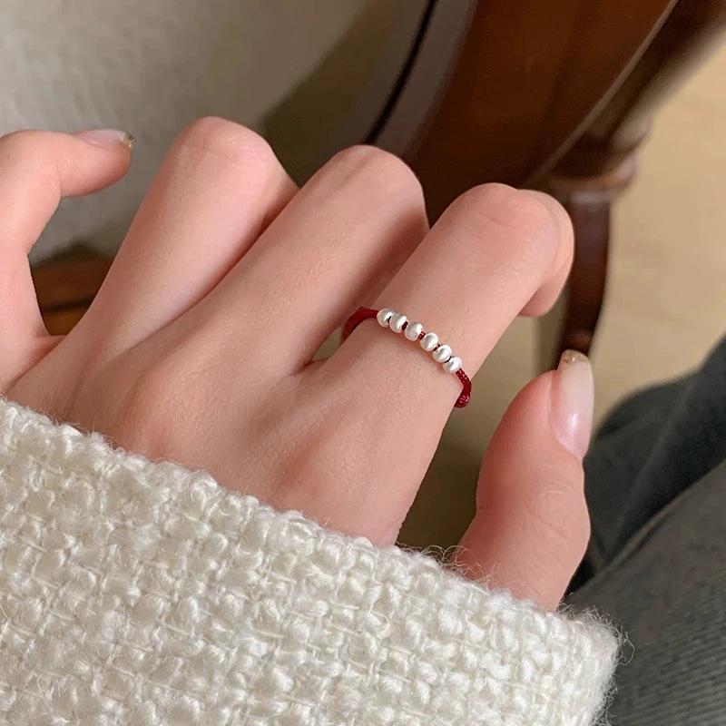 Trendy Ethnic Red String Woven Bead Ring for Women - Simple, Fashionable, Versatile Chinese Style Finger Accessory.