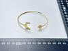 Xia Ling Titanium Steel Sun Moon Open Bangle - Elegant European-American Design for Women's Luxury Fashion.