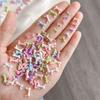 50Pcs Colorful Bow Nail Art Parts Charms Bulk Shiny Mini Resin Ribbon Nail Rhinestones Diy Summer Nail Art Decor Accessories