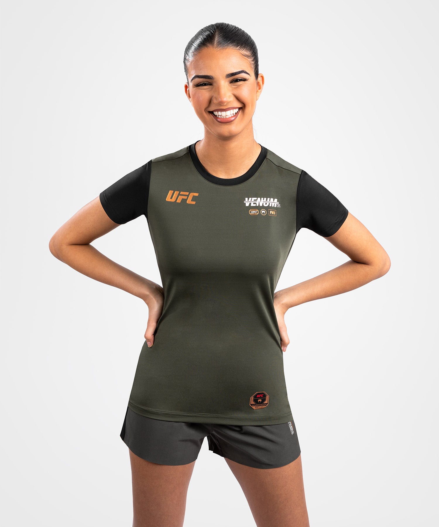 

UFC Adrenaline by Venum Fight Week Женская футболка Dry-Tech - хаки/бронза XS