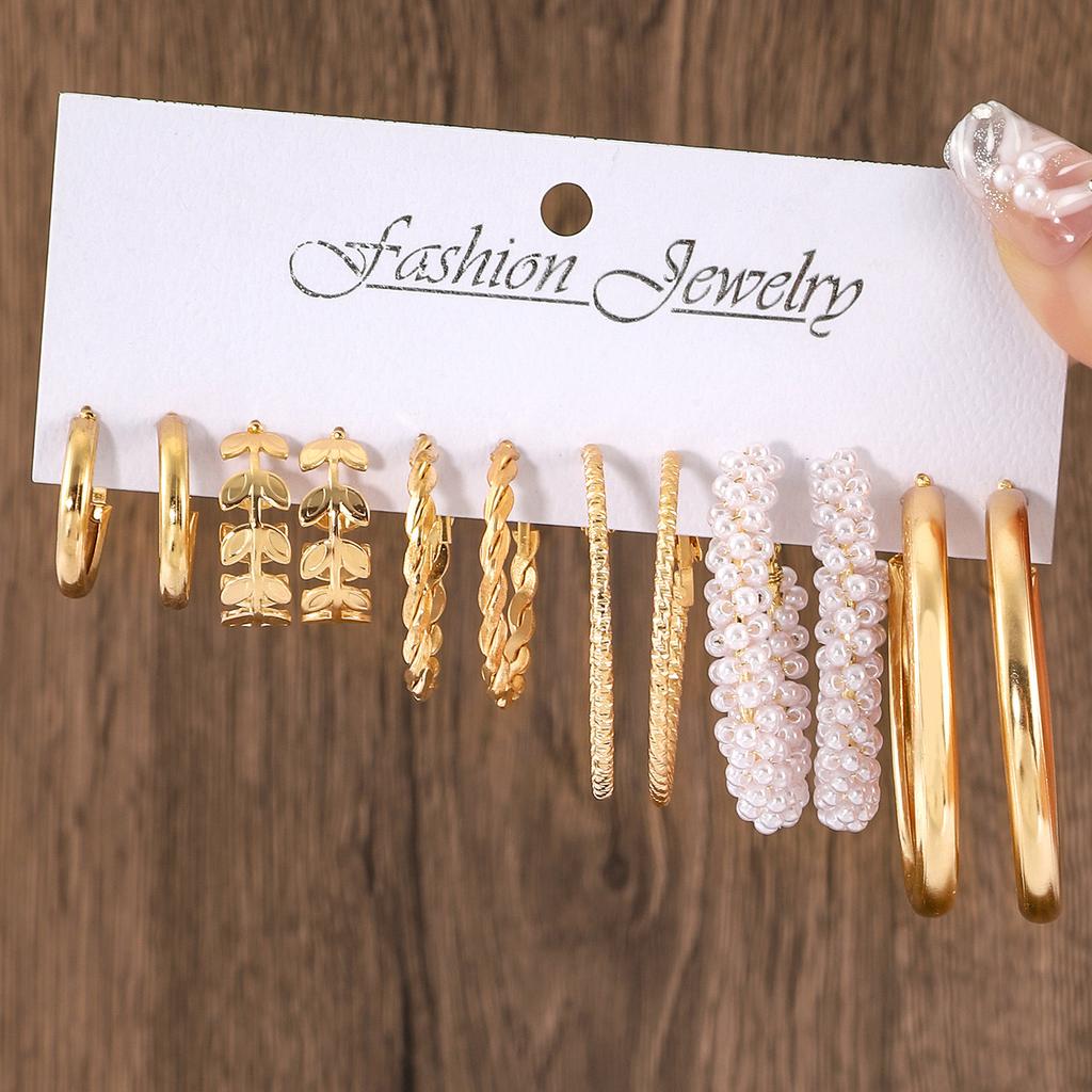 European and American new earrings set 1 pair of golden metal twist pearls creative retro simple and versatile earrings