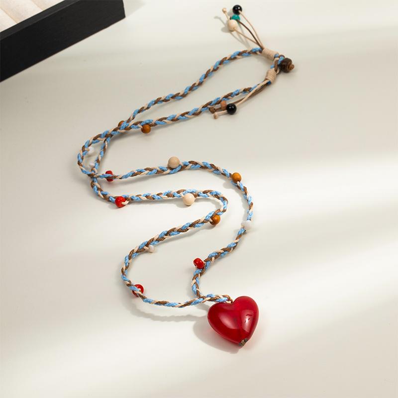 

Exquisite Dopamine Seashell Heart Pendant Necklace for Women - Luxury Braided Rope Sweater Chain