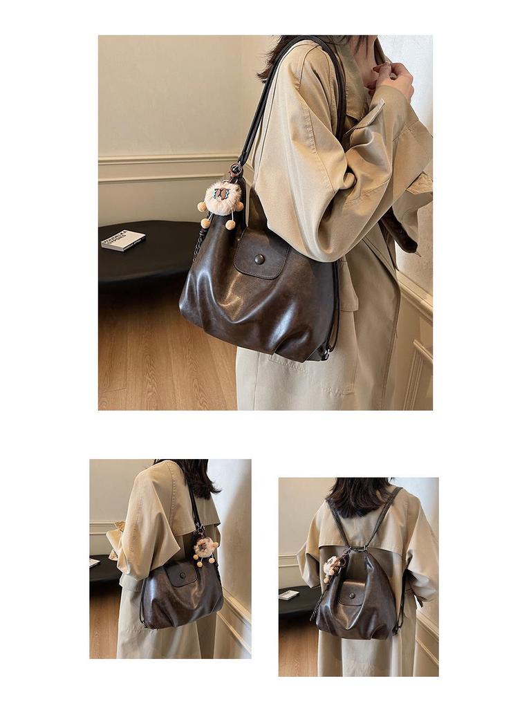 Nische Retro 2025 Damen Schulter-Crossbody-Tasche mit großem Fassungsvermögen und Anhänger