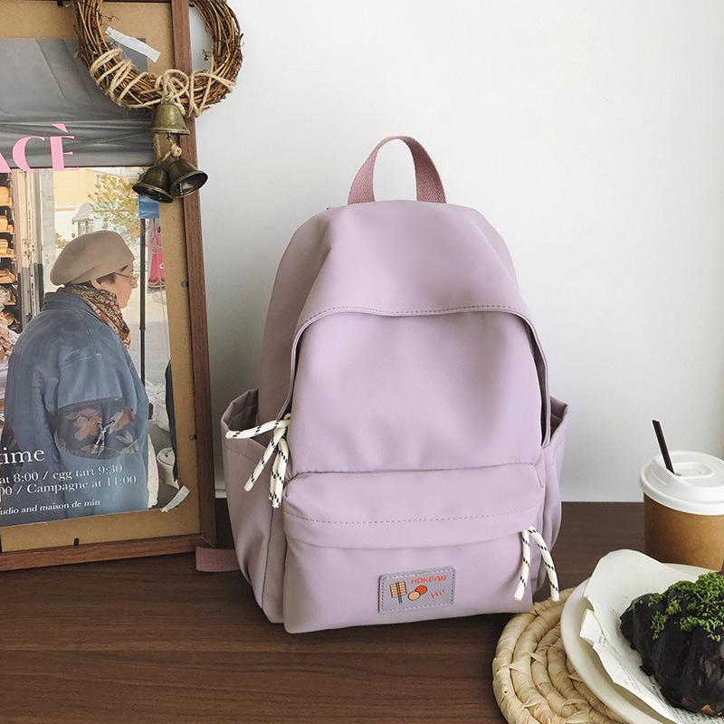 New casual simple solid color backpack large capacity junior high school student schoolbag