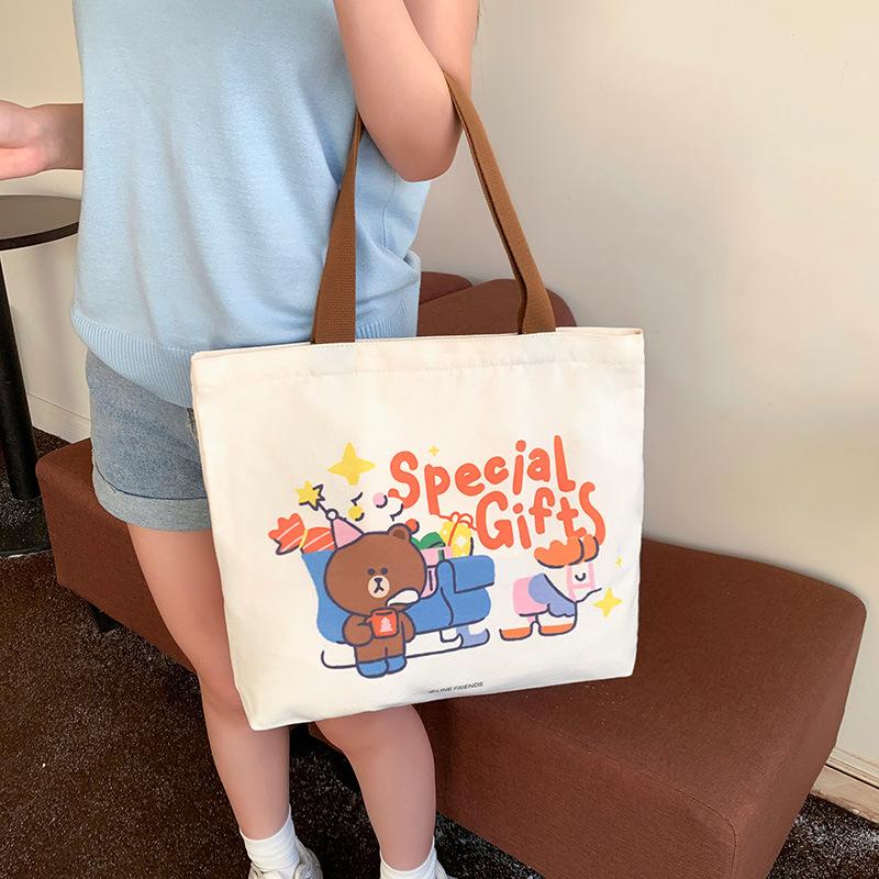 Cute genuine brown bear canvas bag women's new large-capacity zipper student shoulder bag tutoring bag