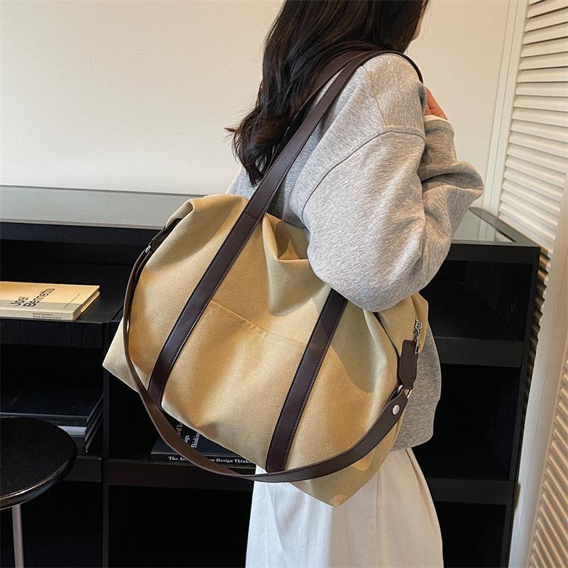 

Korean Style Large Capacity Canvas Tote: Fashionable Casual Shoulder Crossbody Bag for Daily Commute & Travel 44*14*31cm