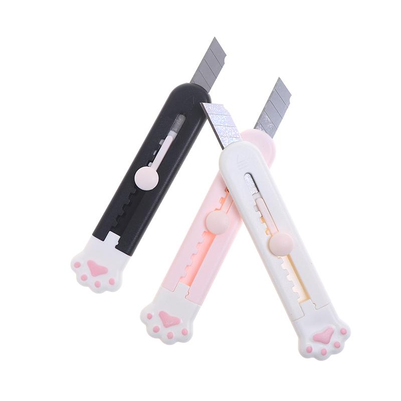 Канцелярский выдвижной нож в пластиковом корпусе с кошачьей лапкой ...