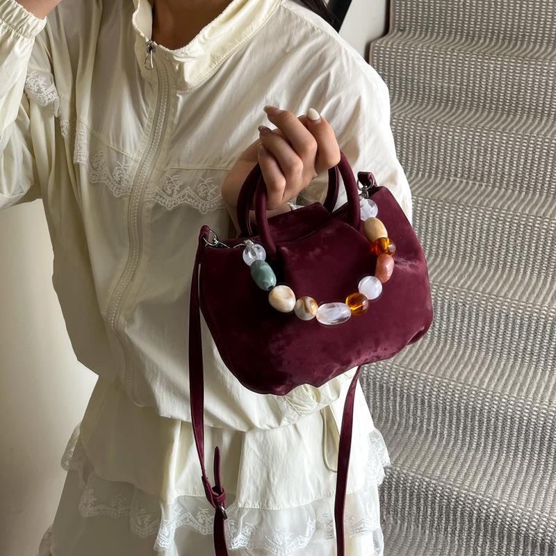 Niche bag women's new summer versatile messenger bag casual pleated portable bucket bag