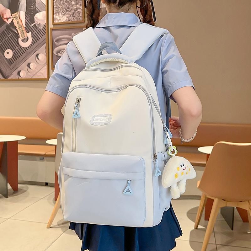 2025 summer new large-capacity literary and versatile high-value schoolbag female junior high school students simple and lightweight backpack