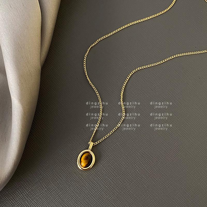 

Retro natural tiger s eye stone collarbone chain women s light luxury niche stacked necklace neck chain sweater chain new explosion