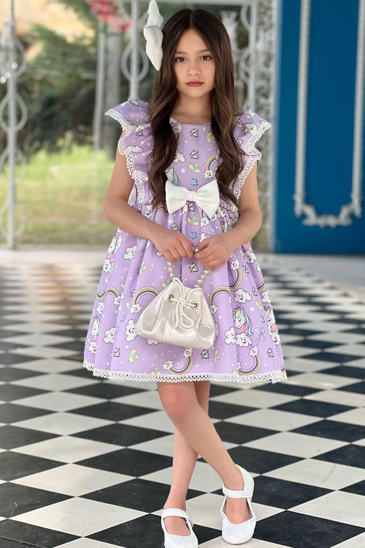 

Сиреневое платье с оборками и вышивкой на рукавах для девочек 3-12 лет