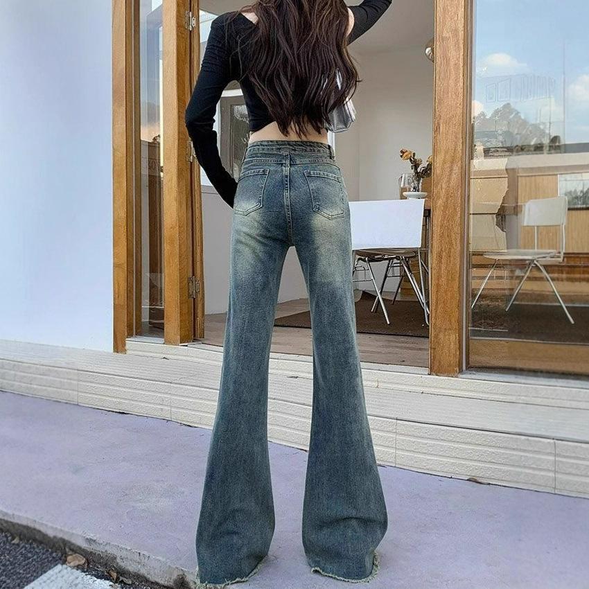 Pear-shaped large-size slightly pulled jeans women's autumn new nostalgic blue fat mm rough-edged high-waisted thin flared pants