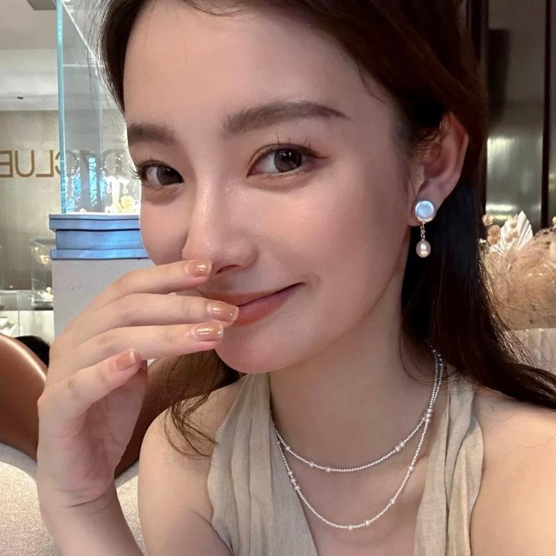 Zhuji Yuhe freshwater button pearl earrings, the same style as worn by the princess S9Silver Needle Baroque Pearl Classic Earrings