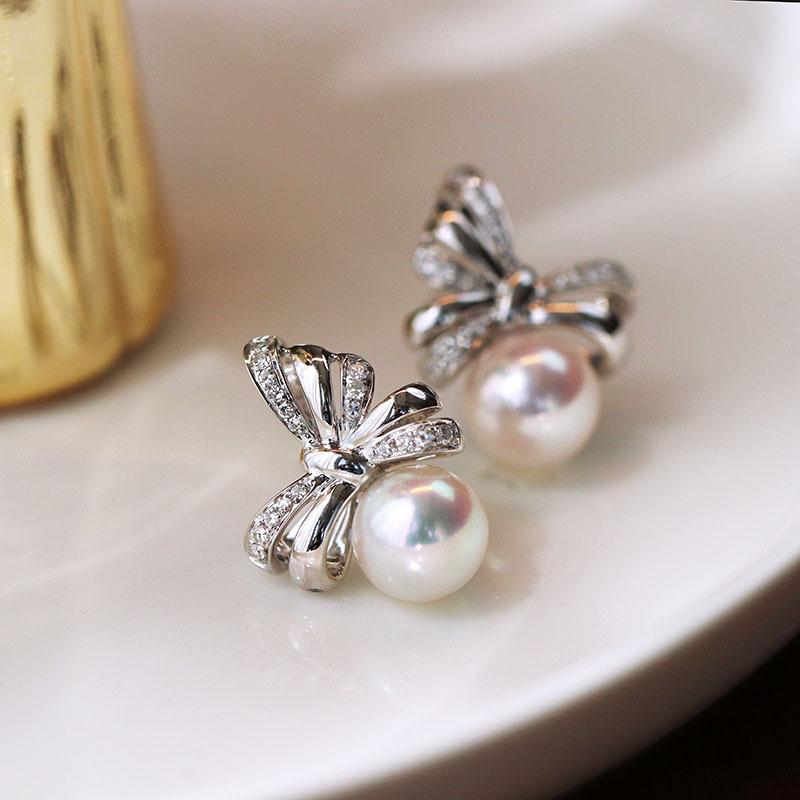 

Elegant Bowknot Pearl Stud Earrings in S925 Sterling Silver - Light Luxury Design for Women s Fashion Jewelry. 925 Sterling Silver