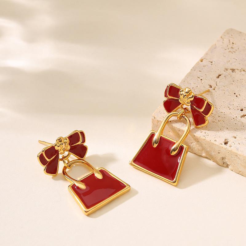

French elegance temperament small fragrance enamel drop glaze red bow bag earrings sweet gentle personality earrings красный